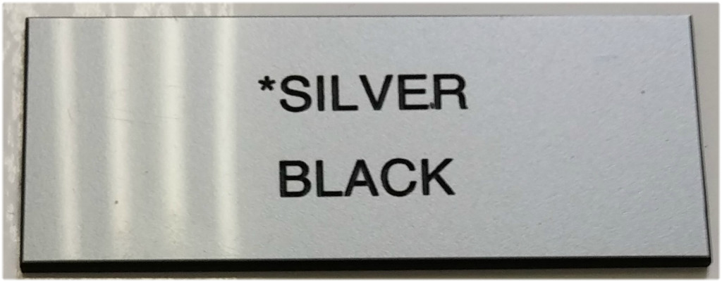 silver_and_black_letters